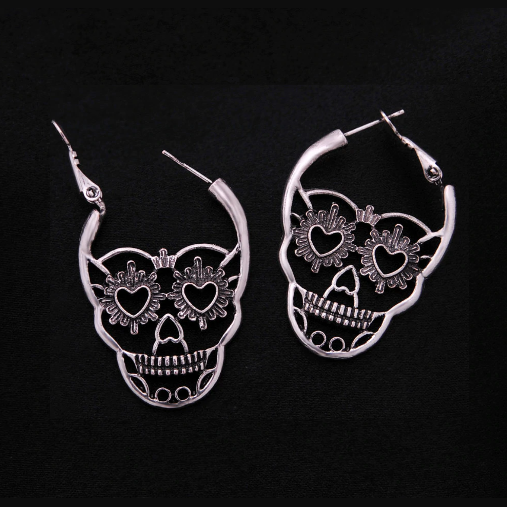 Antique Silver Sugar Skull Earrings opened